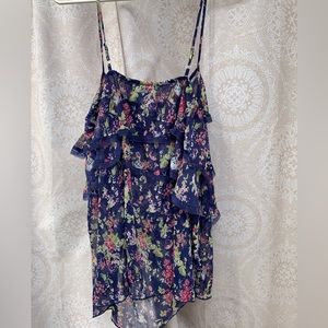 Summer blouse.  Lg. Material has layers. 100% polyester. Does not stretch.